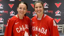 Metis heritage players Jocelyne Larocque and Jamie-Lee Rattray with their Olympic gold medals from Beijing 2022