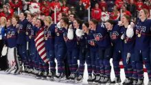 Savannah Harmon and her teammates celebrate winning gold at World Championships