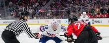 Hannah Brandt (Team USA) lining up for a faceoff against Team Canada