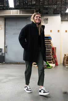 Hannah Brandt walking into the arena smiling
