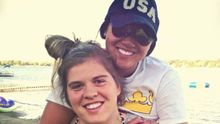 Hannah Brandt and her sister Marissa smiling and embracing