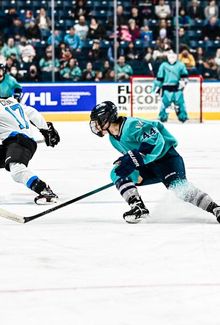 Jill Saulnier (PWHL New York) doing a sharp turn to chase the puck carrier