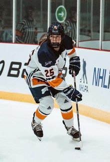 Jamie Bourbonnais picking up speed behind the net in PWHPA action