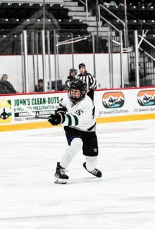 Sam Isbell (PWHL Boston) taking a shot from the point