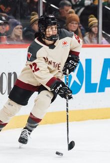 Kennedy Marchment (PWHL Montréal) scanning the ice for a teammate to pass to