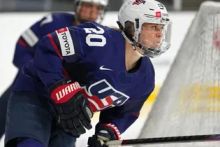 Hannah Brandt (Team USA) skating behind the net