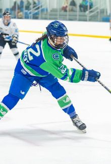 Kennedy Marchment firing the puck on net