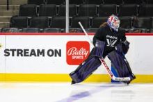 Nicole Hensley preparing at Xcel Energy Center in St. Paul, Minnesota